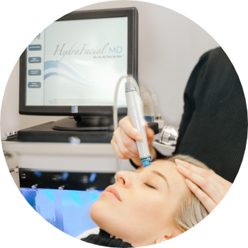 a patient having a hydrafacial rejuvenation treatment for acne at our clinic in London